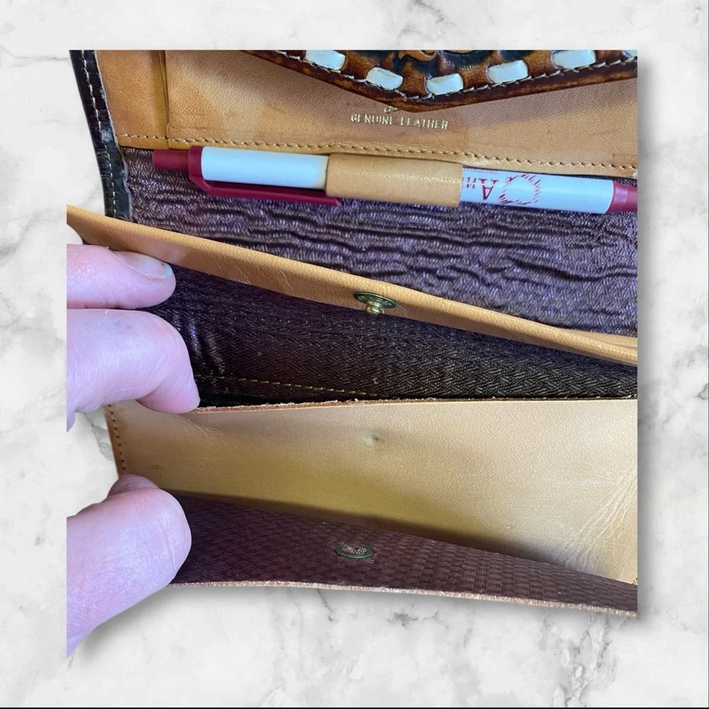 Leather billfold with check and pen spot
